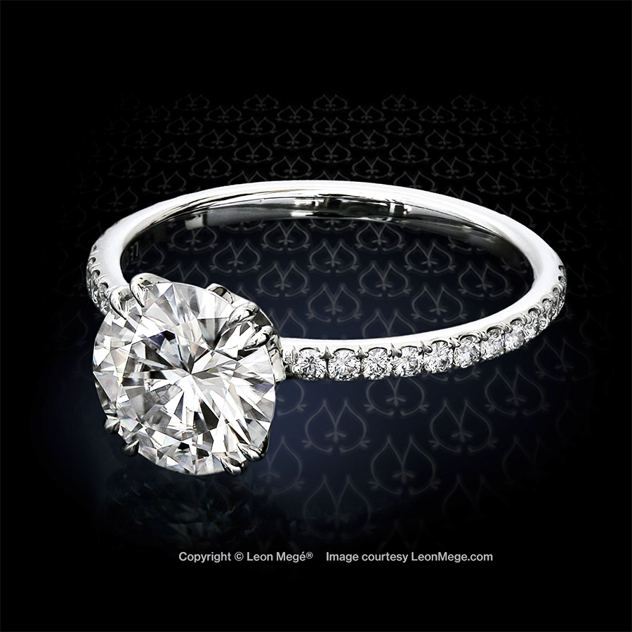 Rachael™ diamond solitaire with a round diamond in a crown-style setting floating over the delicate micro pave band r1319