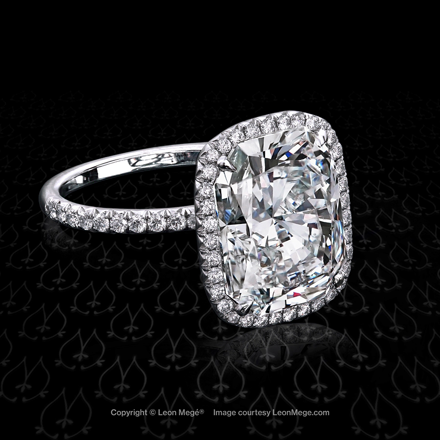 811 halo ring featuring a radiant cut diamond by Leon Mege.