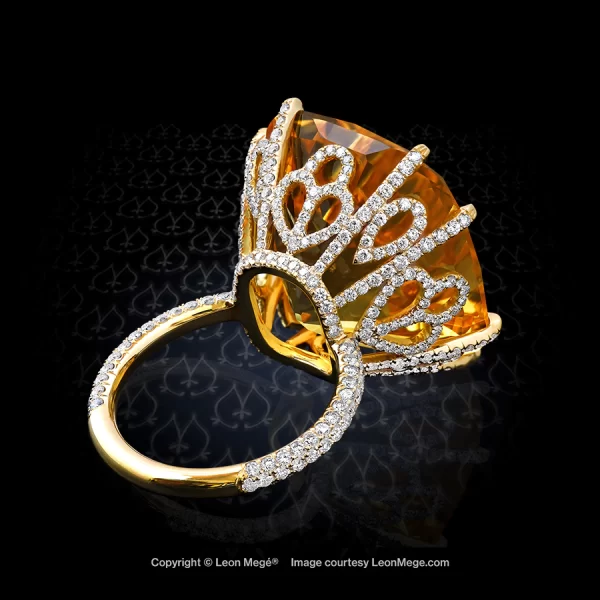 Leon Mege statement ring with a cushion sapphire in an elaborate diamond basket over micro pave shank r5121