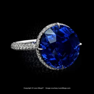 Custom made statement ring featuring a natural Burmese round sapphire by Leon Mege.