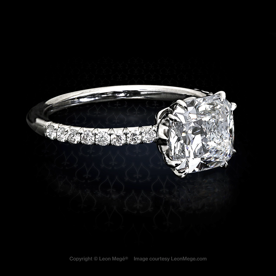 Rachael platinum solitaire featuring a cushion diamond hand-forged by Leon Mege
