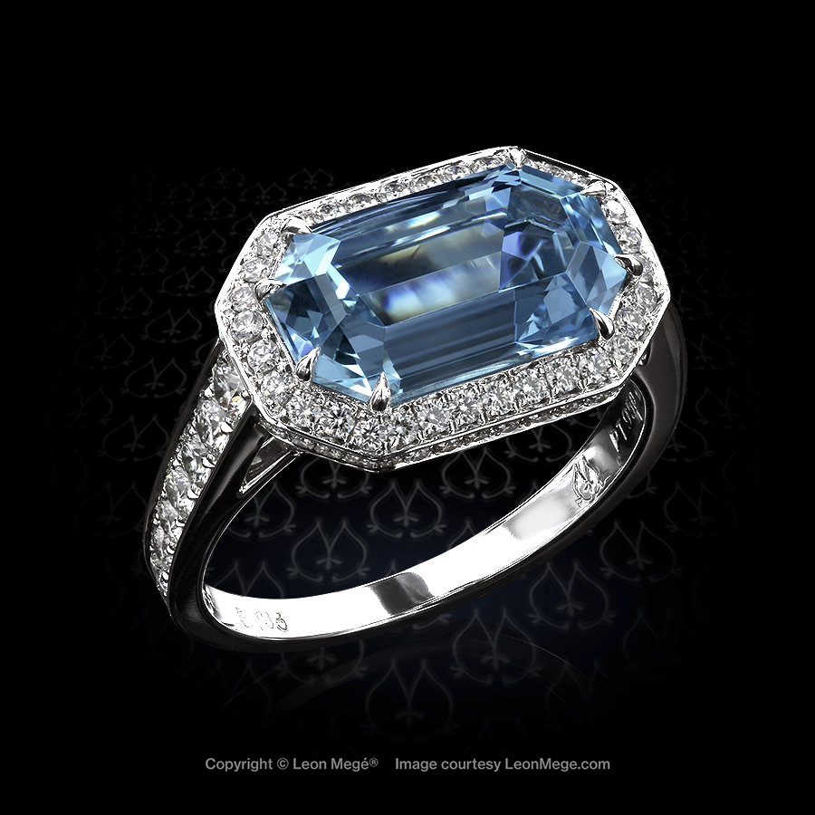 Art deco looking aquamarine ring with double halo by Leon Mege.