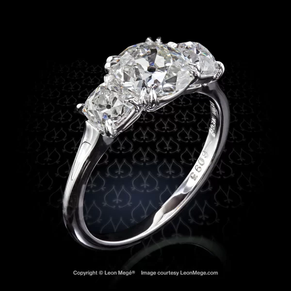 Three-stone ring with True Antique™ cushion diamond by Leon Megé r6093