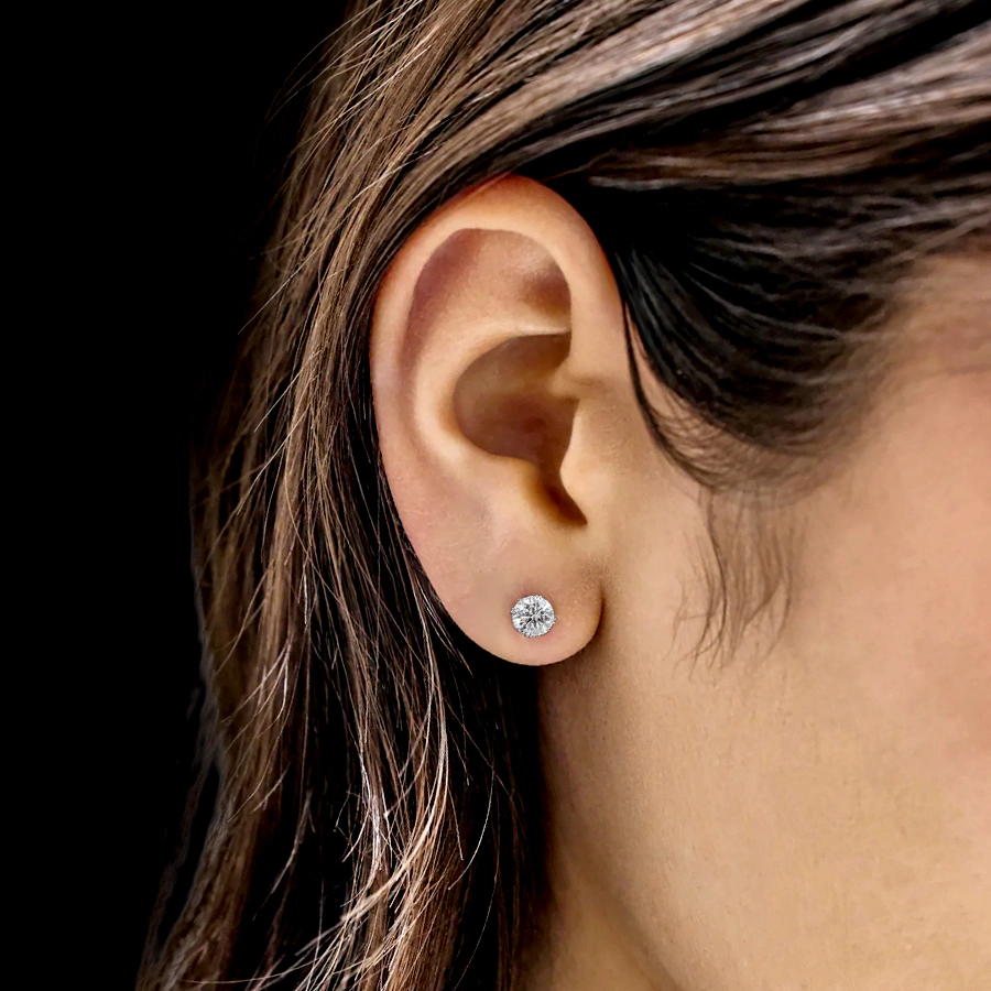Leon Megé bespoke platinum hand-forged studs with round diamonds in double claws e6234