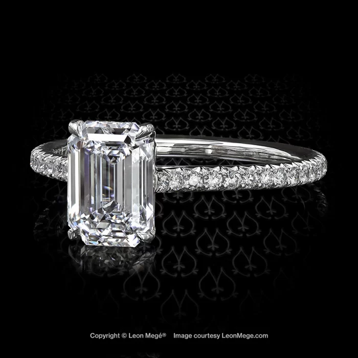 Leon Megé 401™ solitaire with an emerald cut diamond set over a skinny band with micro pave r6344
