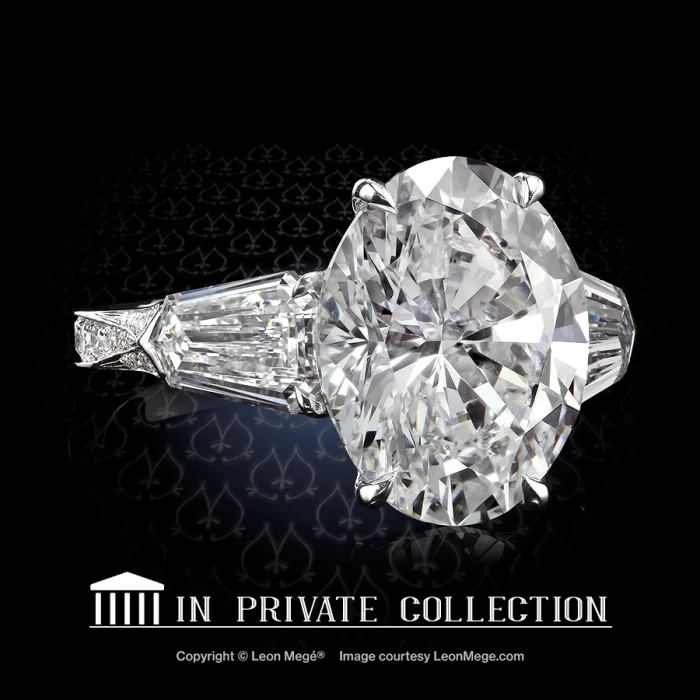 Leon Megé three-stone ring with an oval diamond and shields and diamond pave-set shank r6279