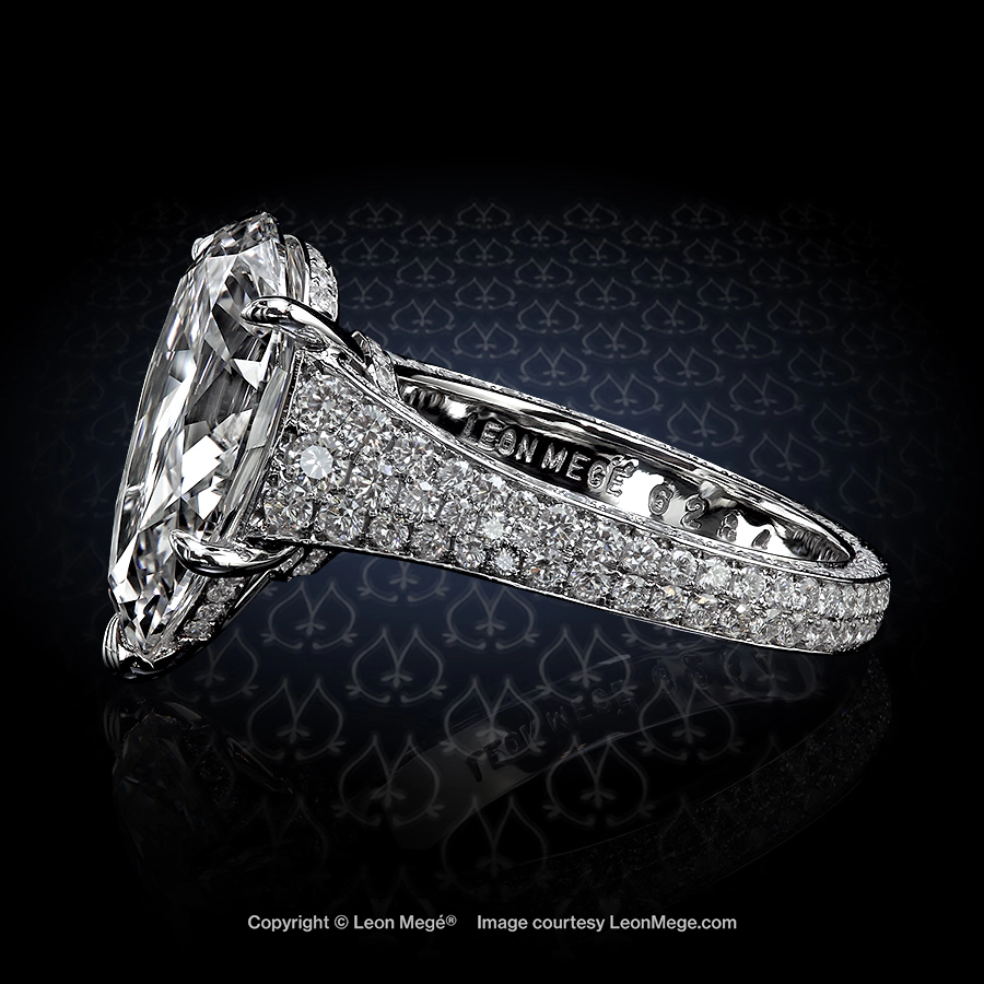 Leon Megé bespoke engagement ring with a pear-shaped diamond and bright-cut pave r6284