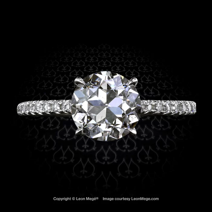 401 solitaire featuring an Old European cut diamond by Leon Mege.