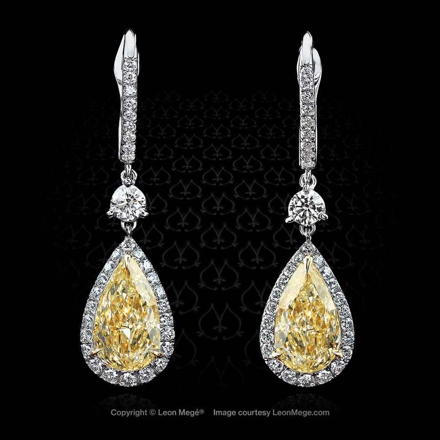 Leon Mege eardrops showcasing fancy yellow pear-shaped diamonds outlined with shimmering micro pave e5837