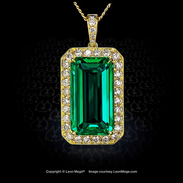 18K yellow gold halo pendant with Colombian emerald and diamond pave by Leon Mege.