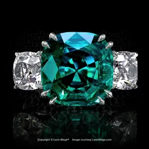 Leon Megé three-stone statement ring with a vivid green Colombian emerald and True Antique™ cushion diamonds in a precision-forged mounting r6432