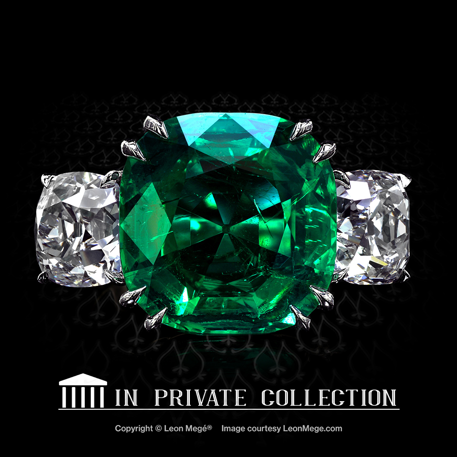 Three-stone ring featuring cushion emerald by Leon Mege.