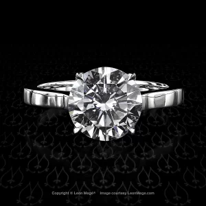 Classic solitaire featuring a round diamond in by Leon Mege.