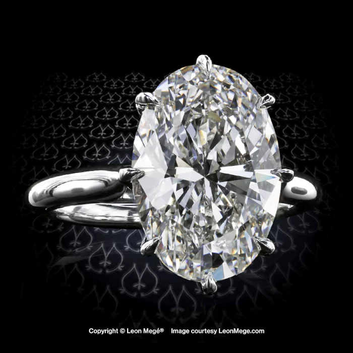 Leon Megé solitaire featuring an exceptional oval diamond in a crown-style setting r6668