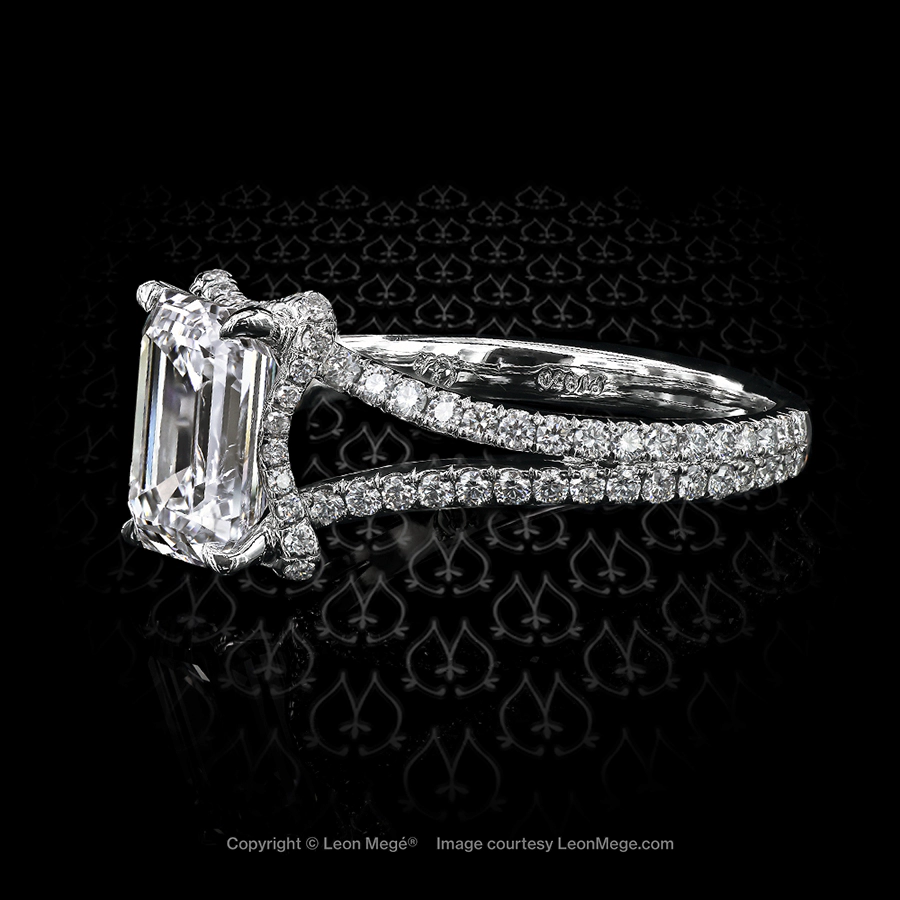 Gina custom emerald cut diamond engagement ring with split shank and micro pave by Leon Mege.