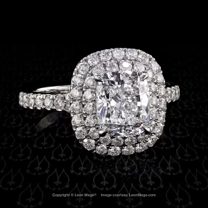 Galaxy halo engagement ring featuring a cushion diamond by Leon Mege.