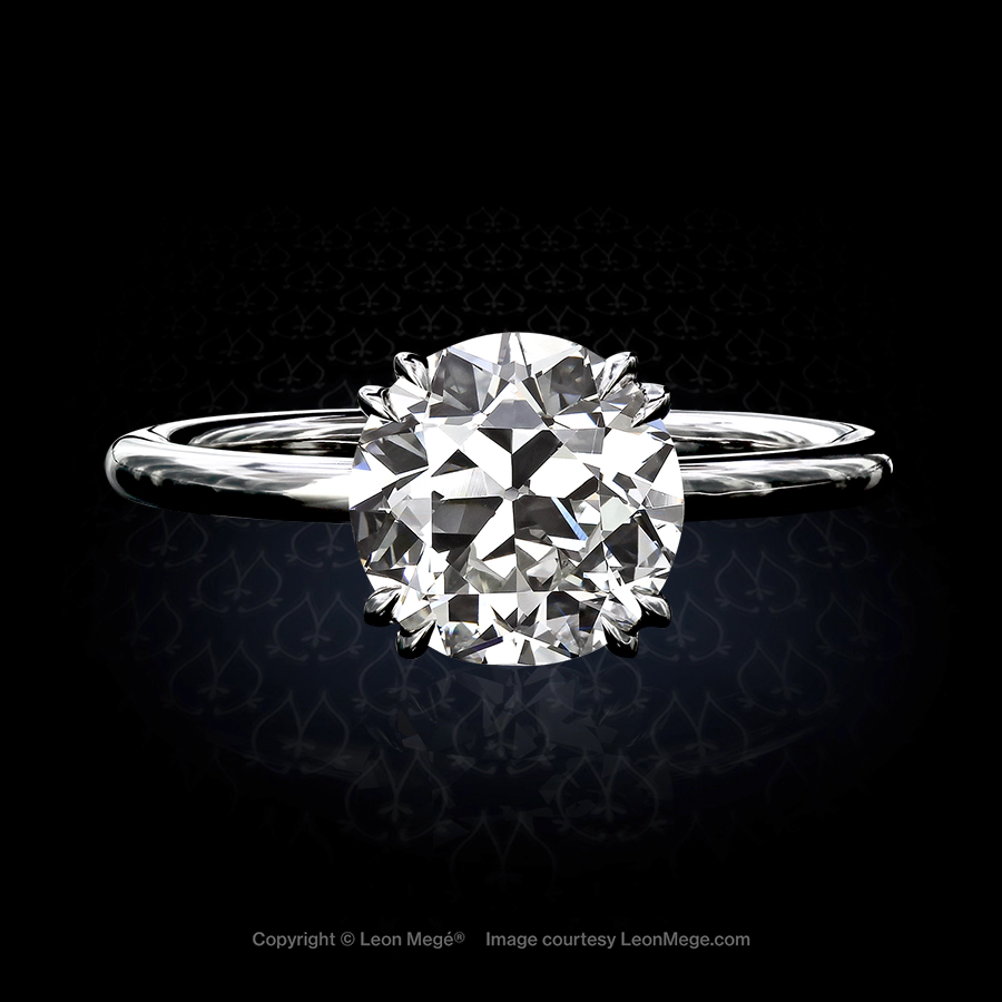Modern solitaire featuring an Old European cut diamond by Leon Mege.