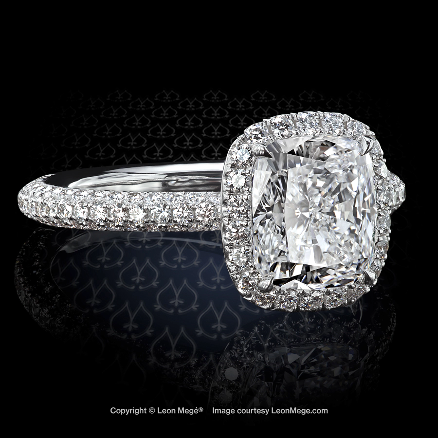 Leon Megé precision-forged exclusive 813™ engagement ring with a cushion diamond in micro pave halo and three-row pave wrap on the shank r6577