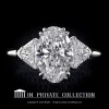 Leon Megé grand classic three-stone ring with oval diamond and a matching pair of shields r6580