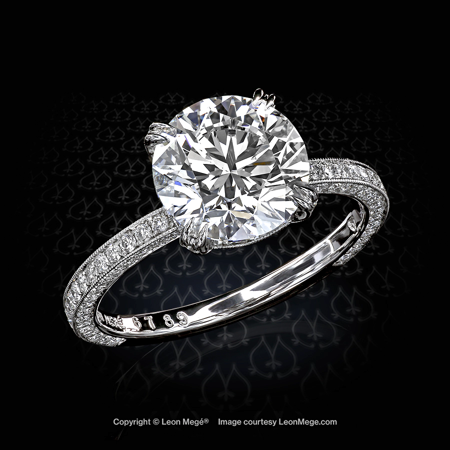 Cosmo engagement ring featuring a round diamond by Leon Mege.