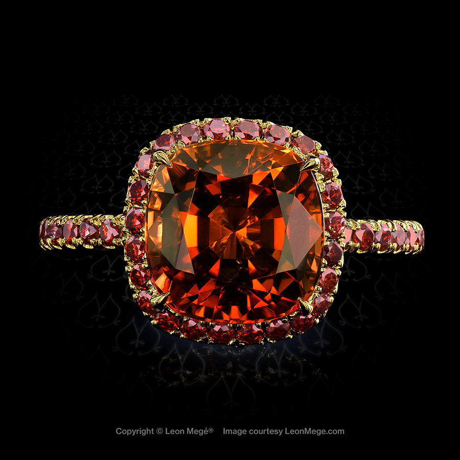 Terra-cotta Tourmaline halo ring with red diamonds by Leon Mege.