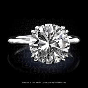 Leon Megé bespoke platinum solitaire with a stunning round diamond in double claw prongs r6551
