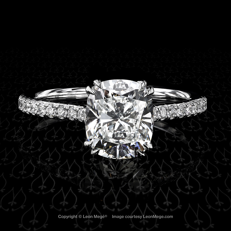 401 engagement ring featuring a cushion cut diamond by Leon Mege.