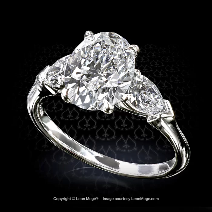 Leon Megé classic three-stone engagement ring with an oval diamond and matching pear shapes r6807