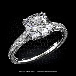 Exquisite Leon Mege 313™ platinum solitaire with a cushion cut diamond in a diamond basket r6825