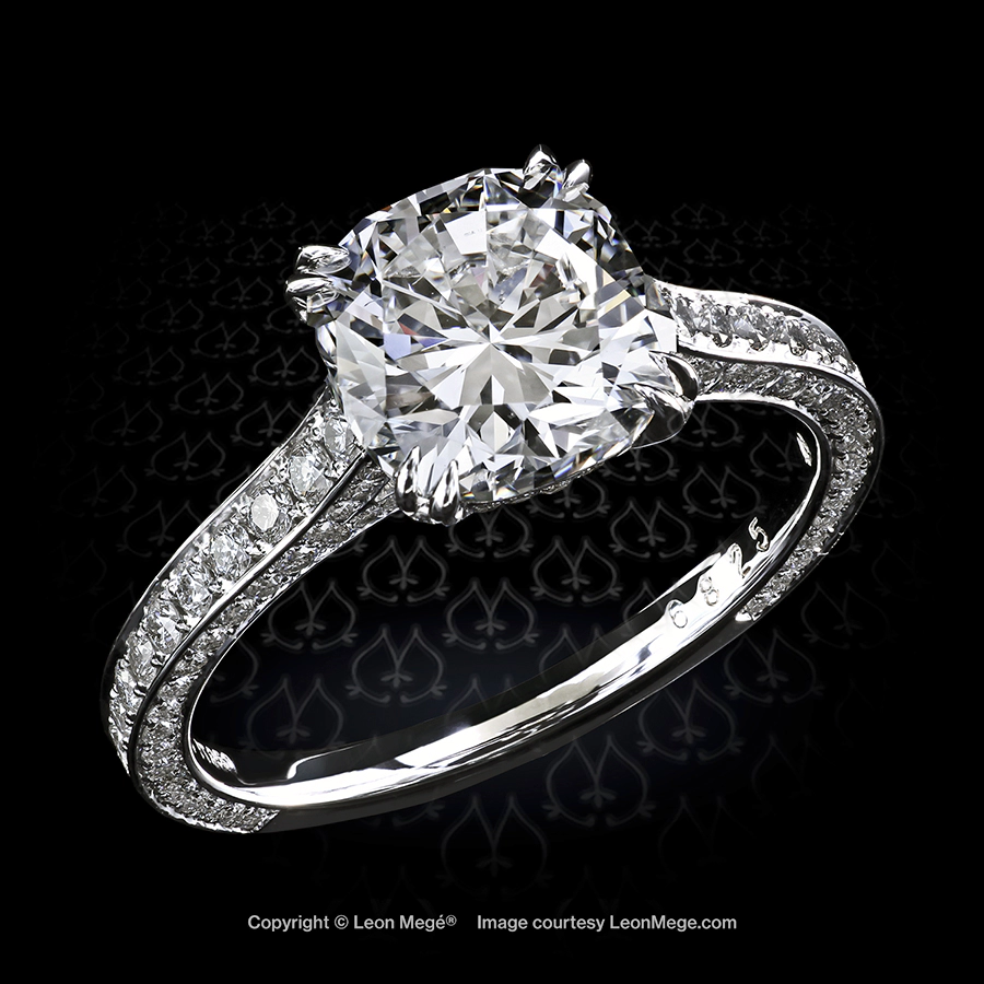 313 engagement ring featuring a cushion cut diamond by Leon Mege.