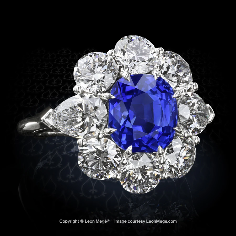Leon Megé precision-forged cluster ring with a stunning Kashmir sapphire surrounded by rounds and pear shape diamonds r6319