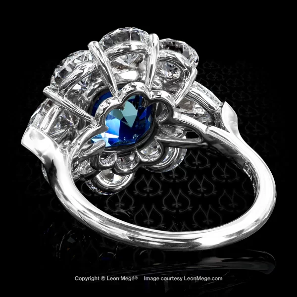 Leon Megé precision-forged cluster ring with a stunning Kashmir sapphire surrounded by rounds and pear shape diamonds r6319