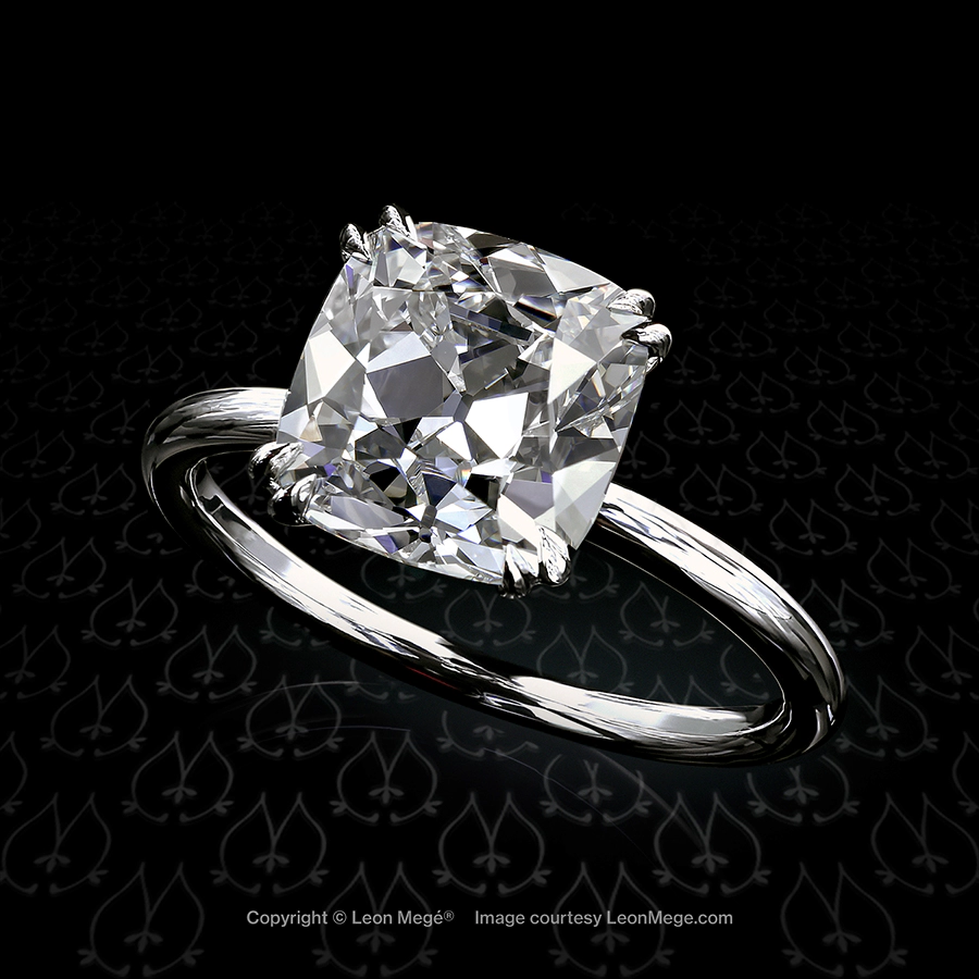 Leon Megé modern solitaire featuring a True Antique™ cushion diamond in double-claw prongs r6852