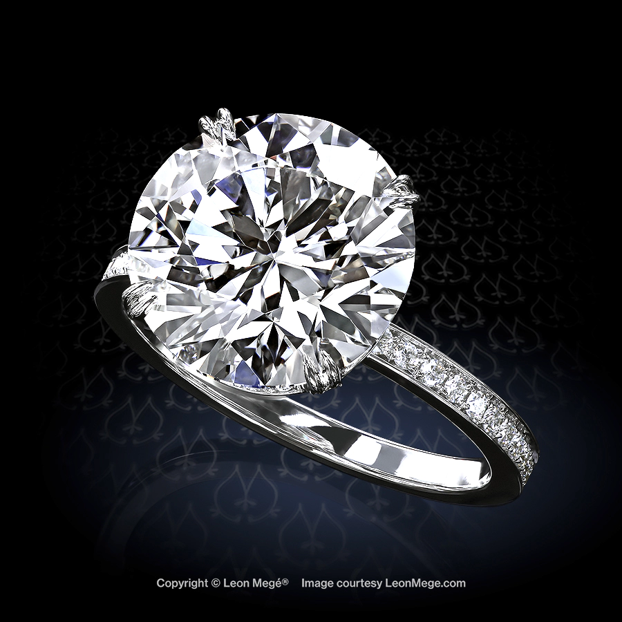 Cosmo engagement ring featuring a round diamond by Leon Mege.