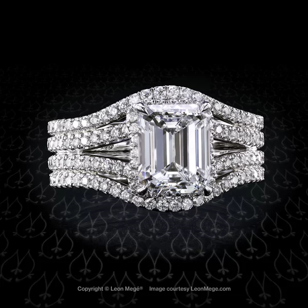 Custom made solitaire featuring an emerald cut diamond by Leon Mege.