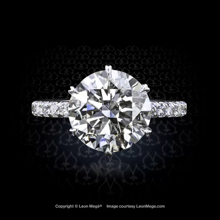 Tulip solitaire featuring a round diamond by Leon Mege.