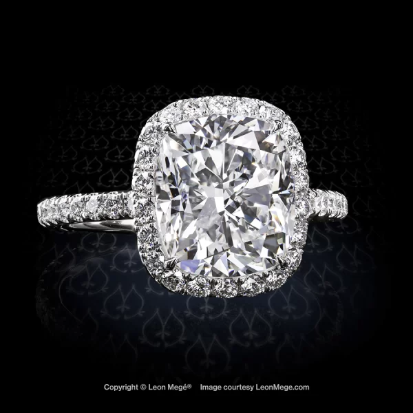 Leon Megé Adrianna™ 811 halo ring with a modern cushion diamond in a hand-forged mounting r6983