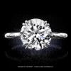 Leon Megé modern solitaire with a round diamond in double-claw prongs on a uniform shank r7046