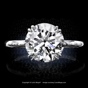 Leon Megé modern solitaire with a round diamond in double-claw prongs on a uniform shank r7046
