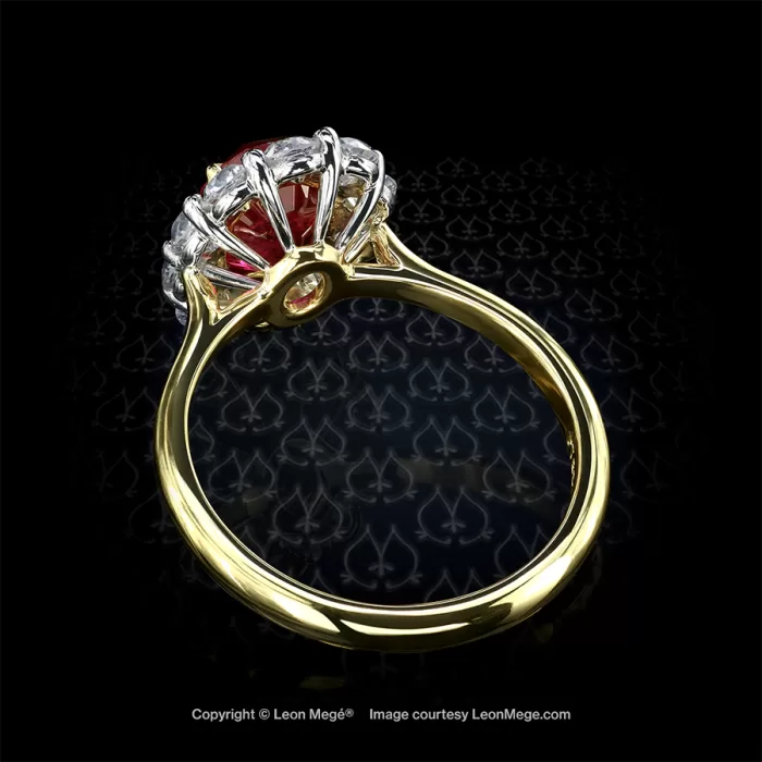 Custom made cluster ring with an oval unheated red ruby by Leon Mege.