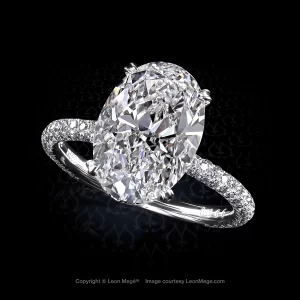 Glamorous Leon Mege 413™ micro pave solitaire with an oval diamond in a hand-forged ring r6960