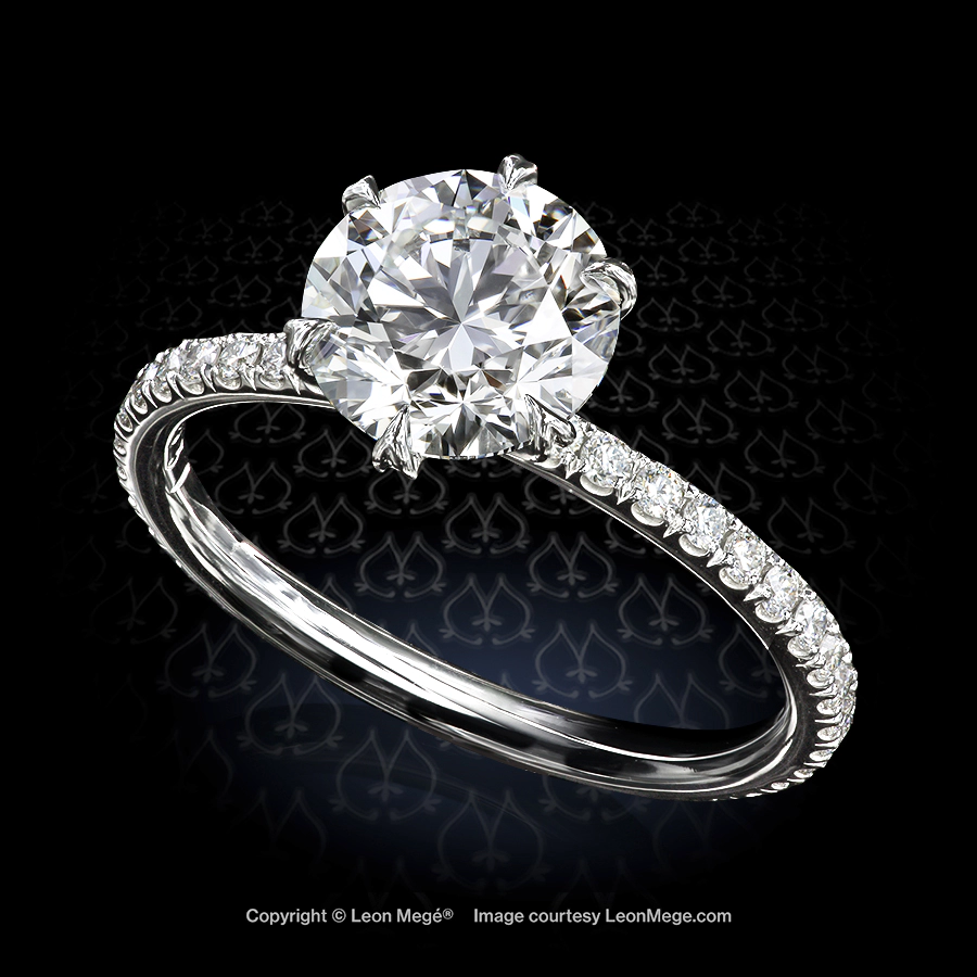 Tulip solitaire in platinum featuring a 1.51-carat round diamond in heart-shaped prongs better than Tiffany by Leon Mege