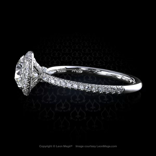 811 halo ring featuring 1.01 carat round cut diamond in a micro pave halo by Leon Mege.