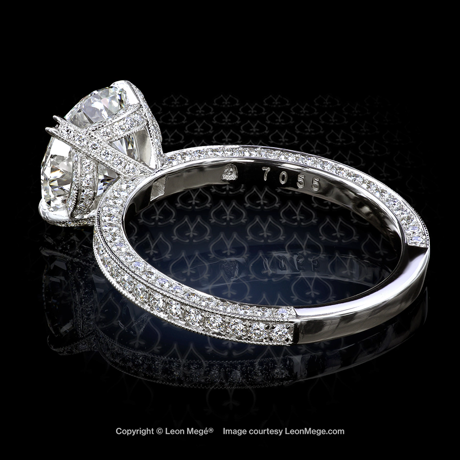Leon Megé exclusive Cosmo™ engagement solitaire with a round diamond and bright-cut pave r7055
