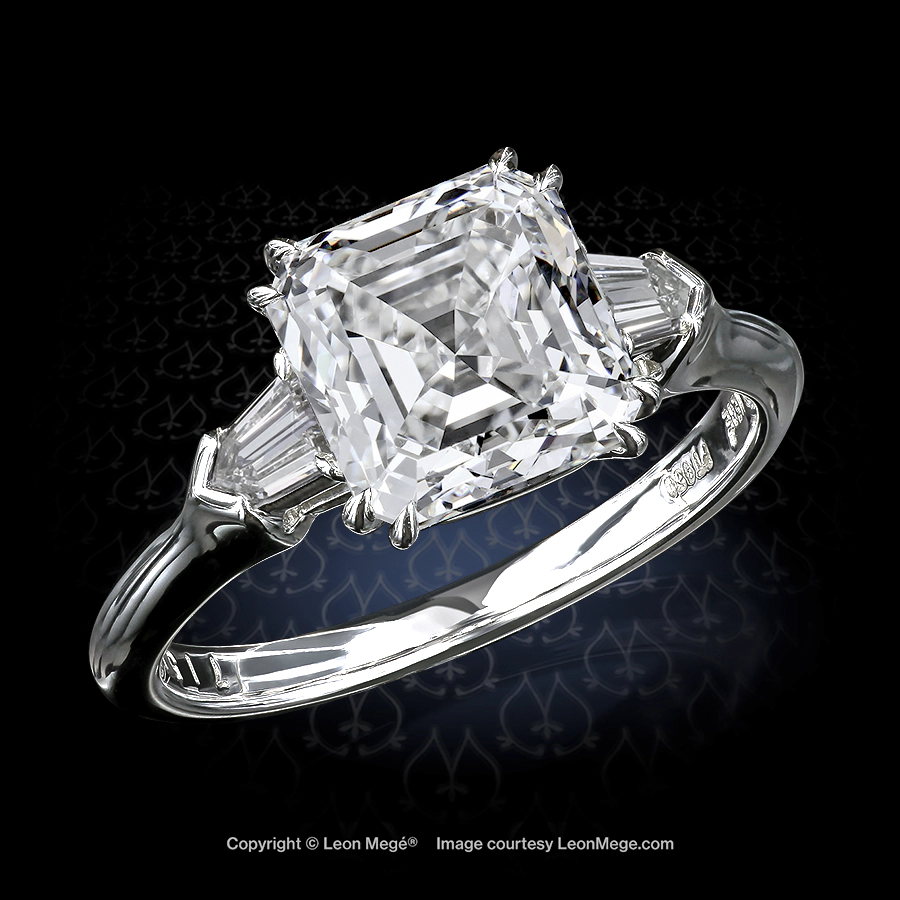 Leon Megé three-stone ring with an Asscher cut diamond flanked by a pair of diamond bullets r7151