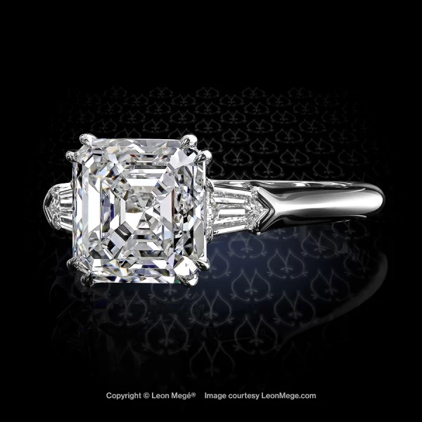 Leon Megé three-stone ring with an Asscher cut diamond flanked by a pair of diamond bullets r7151