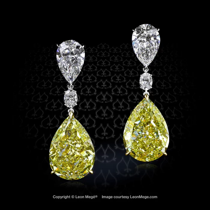 Custom made drop earrings featuring fancy yellow diamonds by Leon Mege.