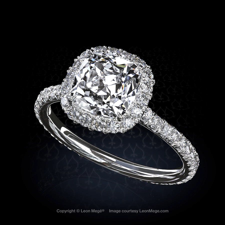 811 Halo engagement ring featuring a True Antique cushion diamond by Leon Mege.