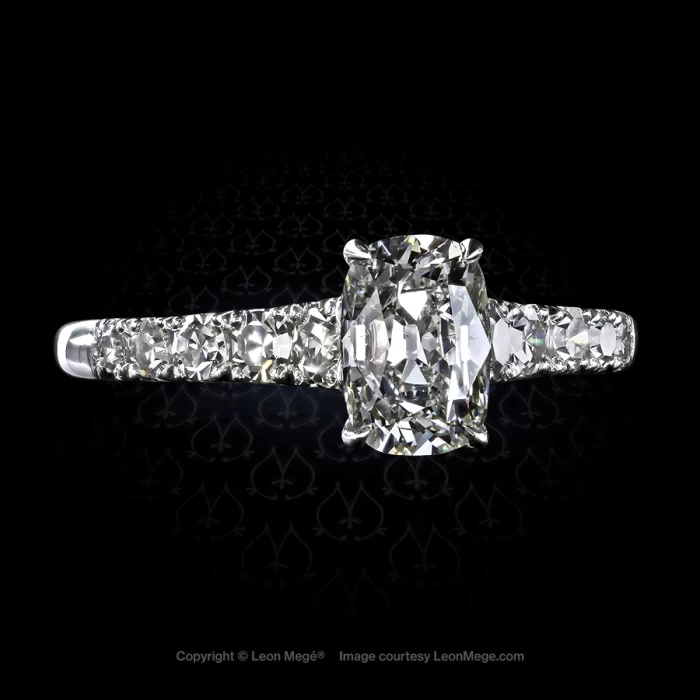 Custom made solitaire featuring a True Antique cushion with single cut diamonds by Leon Mege.