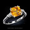 Leon Megé bespoke three-stone ring with a Mandarin garnet and a pair of tapered baguettes r7199
